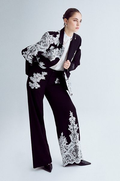 its basic Women's Black Color Lace Relaxed Fit Design Trousers