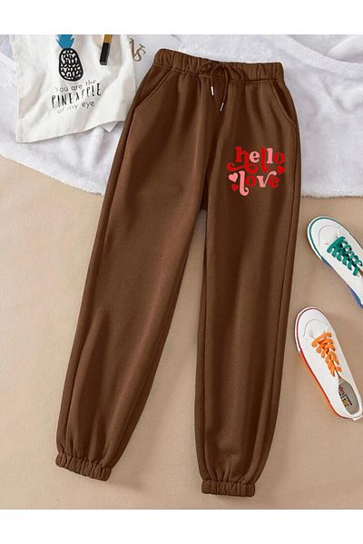RPT MODA ΦΟΡΜΑ JOGGER ΜΕ Άνετο ΕΛΑΣΤΙΚΟ ΠΟΔΙ ΚΑΙ ΤΣΕΠΕΣ HELLO PRINTED JOGGER BOTTOM TRACKSUIT