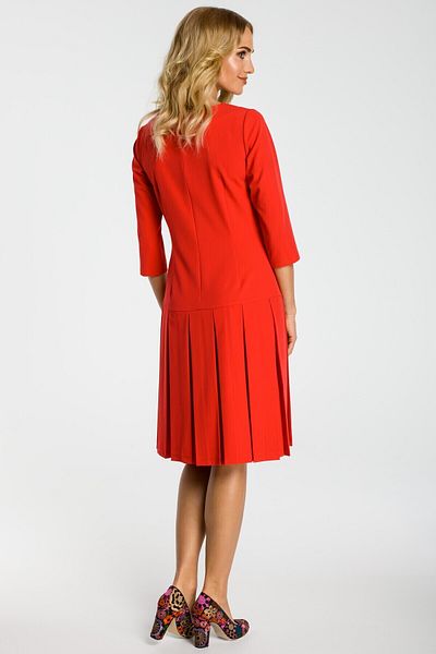 Made of Emotion Choose this short-sleeve drop waist dress with adorable pleats for a girlish elegant look.