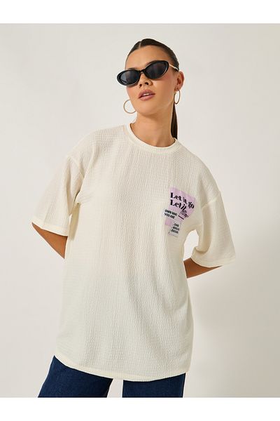 Styli Textured Oversized T-Shirtâ€‹ with Printed Patchwork Detail