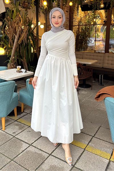 Ovn. Rochie de culoare ecru cu design asimetric