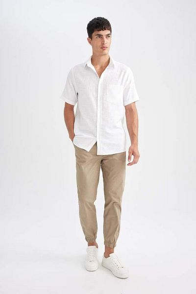 DeFacto Baumwoll-Jogginghose Basic, einfarbig, Taille, Schnürung, Taschen, elastisches Bein D7782ax24au