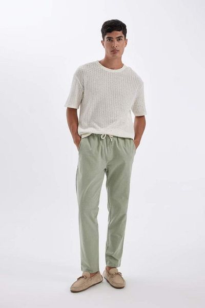 DeFacto Baumwoll-Jogginghose mit schmalem Bein und Schnürung an der Taille und elastischen Taschen Z6475az24au