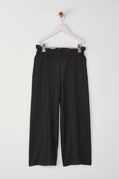 TRENDYOLKIDS Černé dívčí elastické tkané kalhoty v pase TKDSS25PL00007