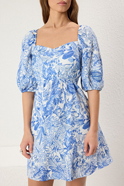 Trendyol Collection Světle modrý květinový potisk - minišaty s otevřeným pasem TWOSS22EL1107