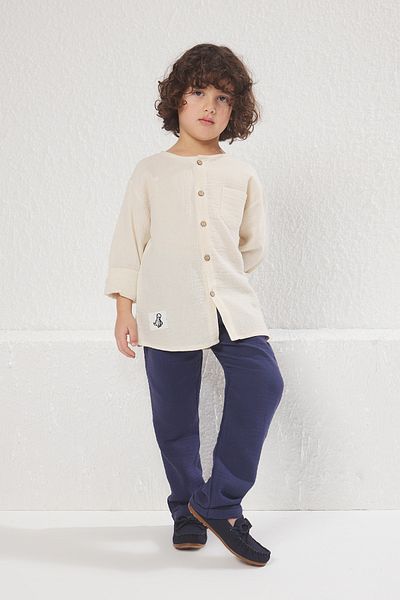 TRENDYOLKIDS طقم قميص وبنطلون محبوك من القطن للأولاد - أكمام طويلة، جيوب، طقم سفلي علوي TKDSS24AU00021
