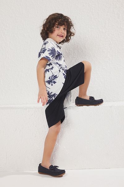 TRENDYOLKIDS Sötétkék virágos szőtt felső öltöny TKDSS25AU00054