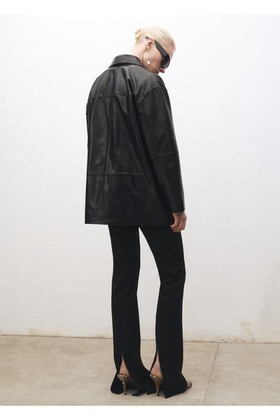 MANGO Woman Yırtmaçlı flare pantolon
