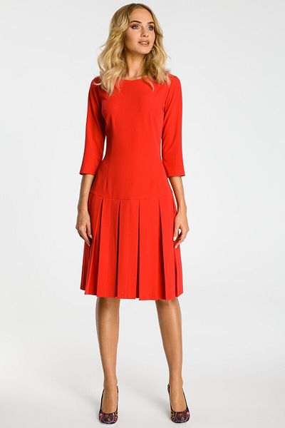 Made of Emotion Choose this short-sleeve drop waist dress with adorable pleats for a girlish elegant look.