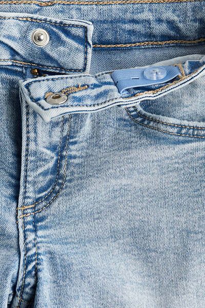 H&M بنطال جينز واسع الساق فائق المرونة