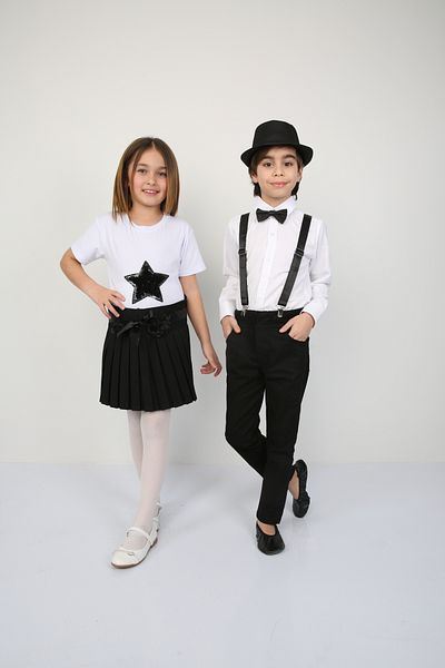Ümiteks world of clothes April 23 Show - Girl's Black Star Print and Black Pleated Skirt Set