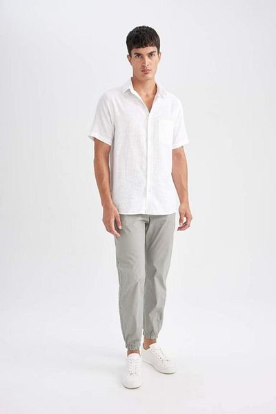 DeFacto Baumwoll-Jogginghose Basic, einfarbig, Taille, Schnürung, Taschen, elastisches Bein D7782ax24au