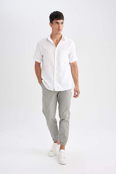 DeFacto Baumwoll-Jogginghose Basic, einfarbig, Taille, Schnürung, Taschen, elastisches Bein D7782ax24au