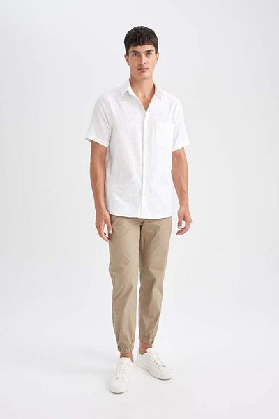 DeFacto Baumwoll-Jogginghose Basic, einfarbig, Taille, Schnürung, Taschen, elastisches Bein D7782ax24au