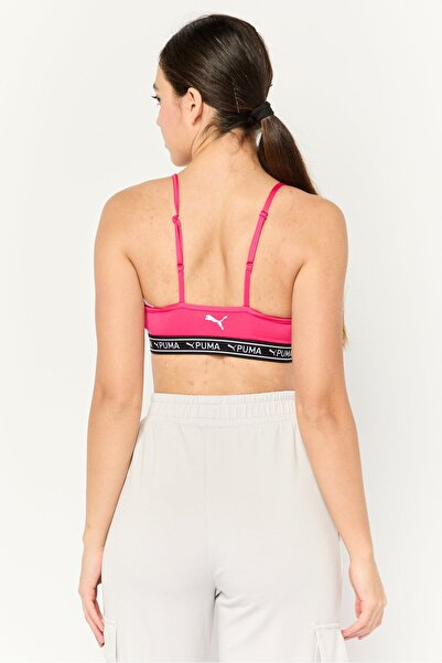 Puma حمالة صدر رياضية مبطنة قليلاً بشعار العلامة التجارية للنساء، باللون الوردي