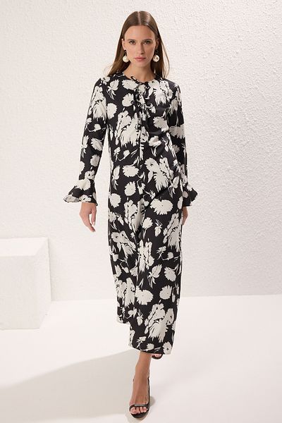 Trendyol Modest Vzorované tkané černé šaty - detail mašle TCTAW25EB00109