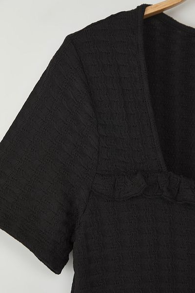 Trendyol Curve Schwarze, strukturierte, gestrickte Plus-Size-Bluse
