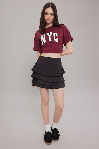 Trendyol Collection Fusta mini neagră elastică și cu volane - TWOSS25ET00088