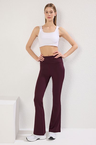 Trendyol Collection Gerippte spanische Yoga-Leggings in Dunkelkirsche - TWOAW23TY00011