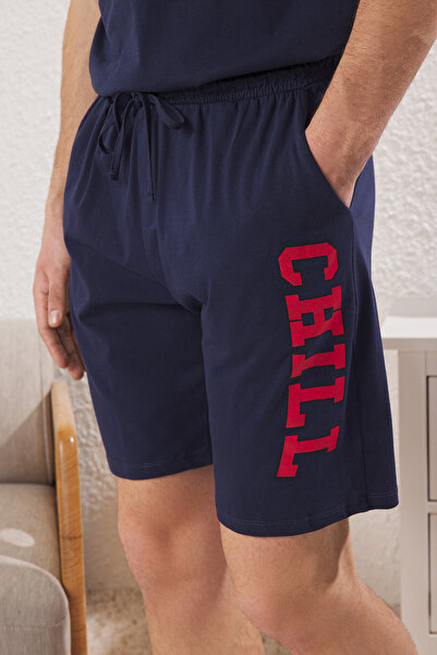 Trendyol Collection Marineblaues Strick-Pyjama-Set mit normaler Passform und bedruckten Shorts TMNSS25PT00015