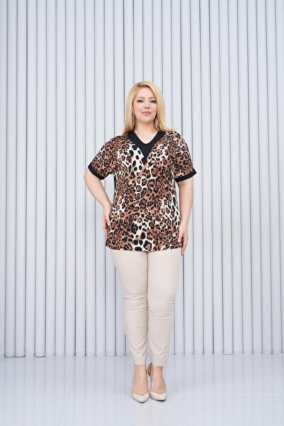 Siyezen بلوزة بأكمام واسعة ورقبة على شكل حرف V مقاس كبير