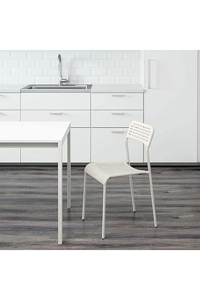 MAAS Versatile modern dining chair with simple and unique design, perfect for all types of home decor.