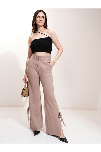 Tokyo Talkies By Styli Mid Rise Flared Trousers with Bow Tie Detail