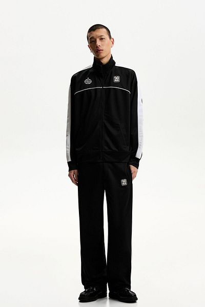 Bershka Embroidered technical trousers