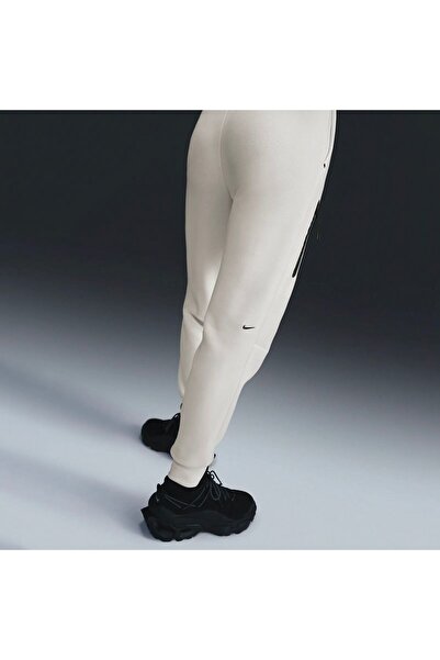 Nike Pantaloni trening NIKE pentru femei NSTCH FLC MR JGGER 2 - HV6779110