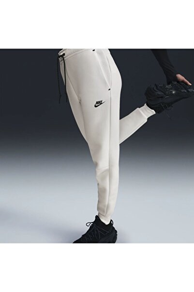 Nike Pantaloni trening NIKE pentru femei NSTCH FLC MR JGGER 2 - HV6779110