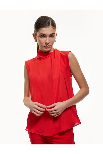 Koton Buttoned Asymmetrical Stand Collar Sleeveless Crepe Blouse