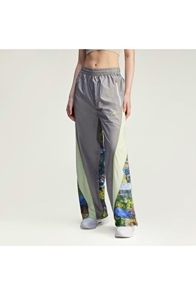 adidas من Stella McCartney Earth Collage بنطال رياضي نسائي منسوج