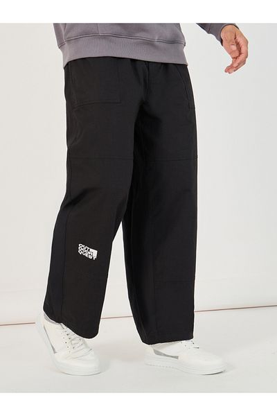 Styli Slogan Print Baggy Parachute Fit Pants with Drawstring