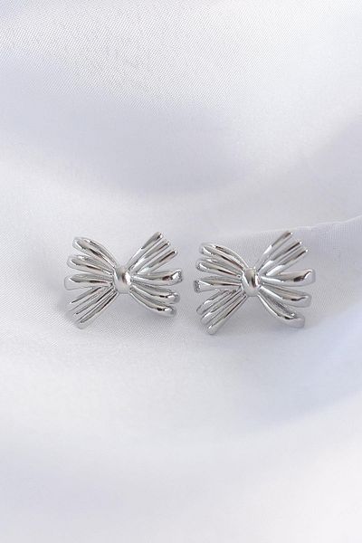 Celira Brass Silver Color Bow Earrings
