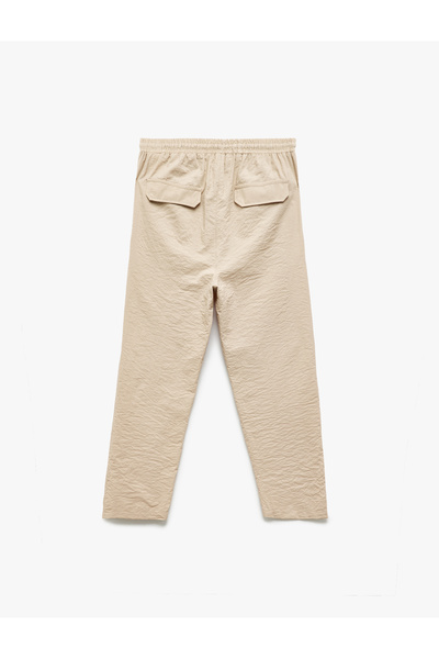 Koton Beli Bağlamalı Cepli Balon Form Pantolon