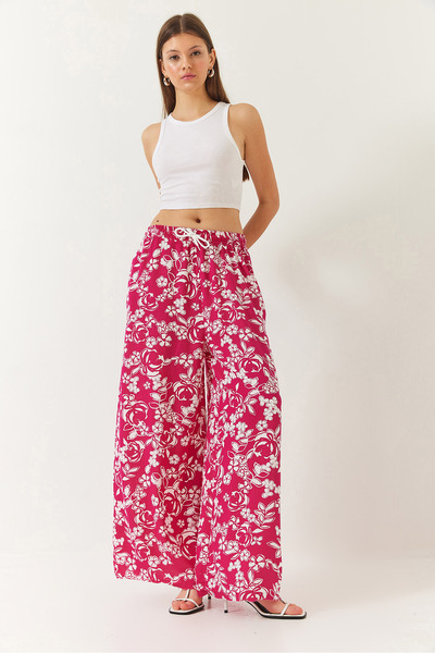 Bianco Lucci Women's Elastic Waist Tie Patterned Pocket Viscose Palazzo Trousers 60261433