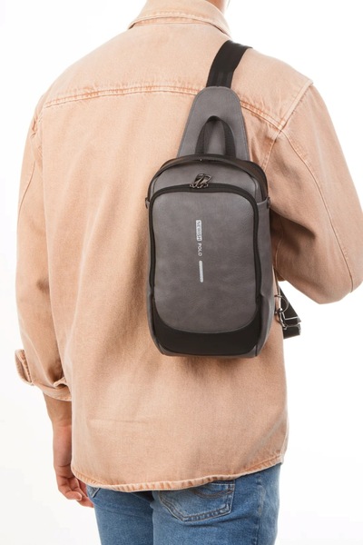 Newish Polo Uziko-Suni Leather Body Bag Cross Backpack with USB Cable Sticker