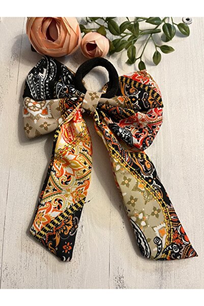 BERG ATELIER Кольорова гумова шпилька з бантиком