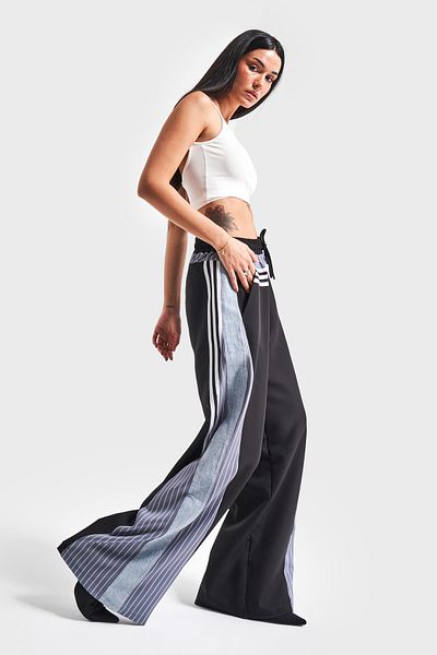its basic Women's Denim Color Denim Fabric Fragmented Stripe Detailed Loose Cut Design Denim Trousers