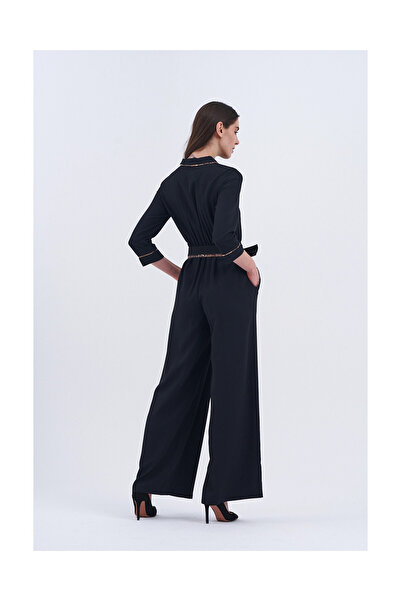 MODATALİKA Trend Kadın Modayı cesur bir adım ileri taşıyan leopar detaylı kemerli tulum modelimizle tanışın!