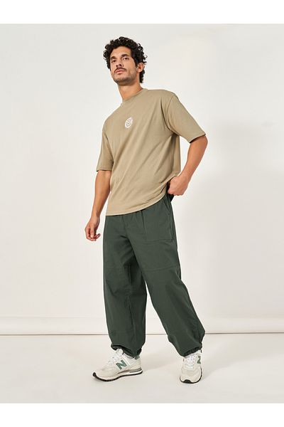 Styli Mid Rise Baggy Parachute Fit Pants