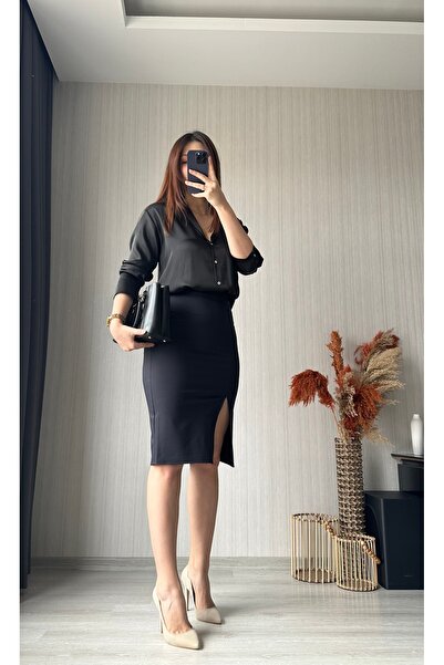 FASİON Fusta neagră cu detaliu de șliț