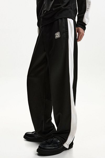 Bershka Embroidered technical trousers