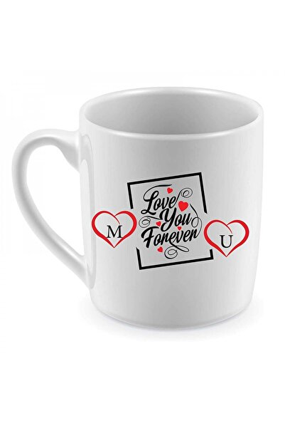 Be Care A double-sided tea mug with the letters M & U printed on it in Englis...