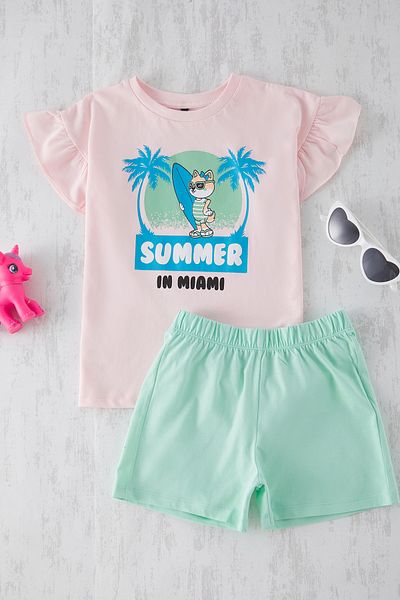 TRENDYOLKIDS Růžová dívka 100% bavlna s potištěným volánem Detailní pletená sada pyžama TKDSS25PT00025