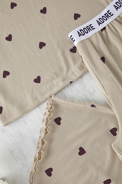Trendyol Curve Mint Heart Slogan Rubber Detailliertes, geripptes Strick-Pyjama-Set TBBSS25AI00101
