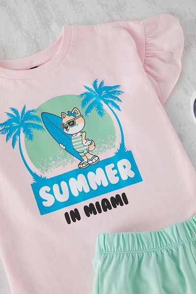 TRENDYOLKIDS Růžová dívka 100% bavlna s potištěným volánem Detailní pletená sada pyžama TKDSS25PT00025