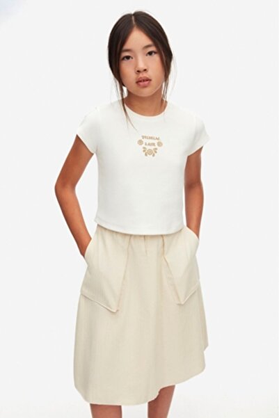 nk kids 58319 SPODNJICA OD ŠKOLJKE KREMA 8/14