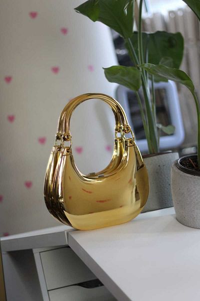 Moom Bag Geantă de seară subțire, metalică, auriu, cu mâner din mica