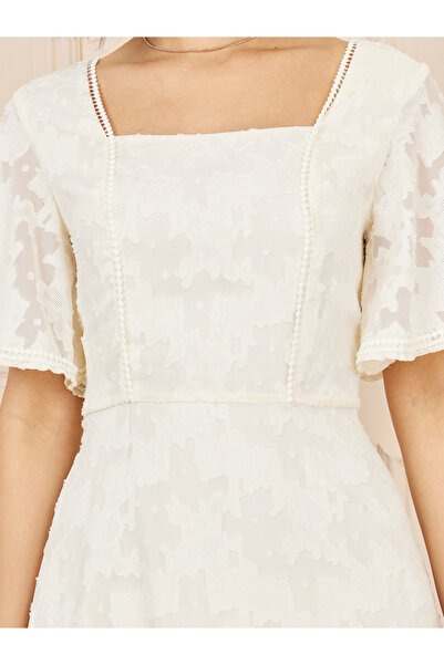 Styli Burnout Texture Ruffle Hem A-Line Midi Dress